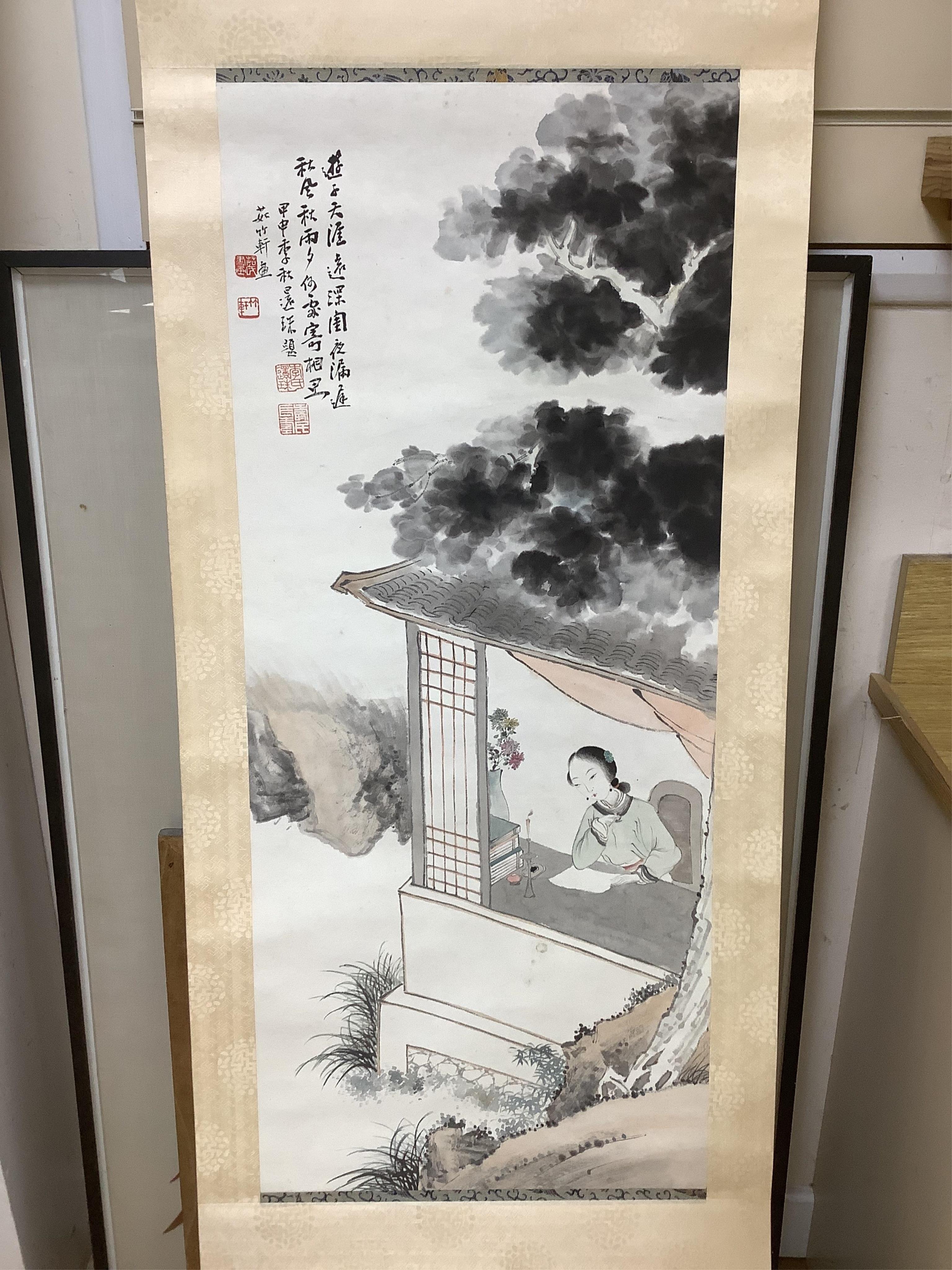 A set of four Chinese scroll paintings of ladies before landscapes, 48cm wide. Condition - fair